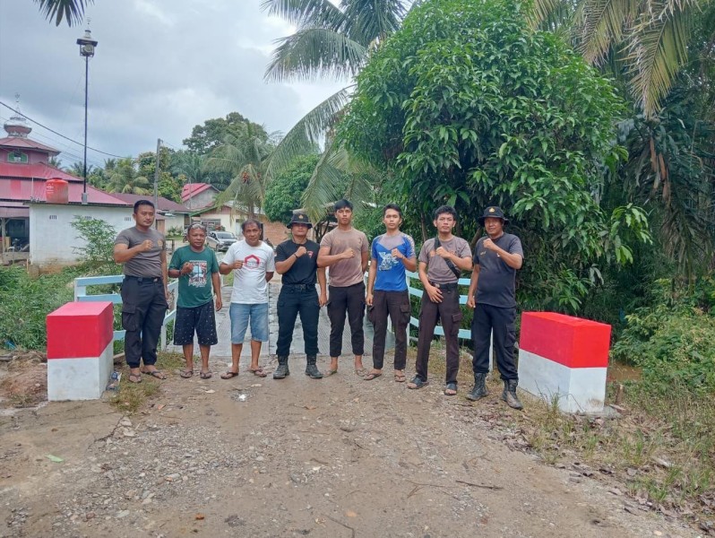 Akses Harapan Terbuka, Satbrimob Polda Riau Rampungkan Pembangunan Jembatan di Rokan Hulu