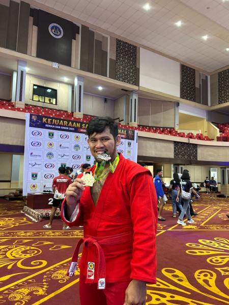 ROTAMA SILALAHI HARUMKAN NAMA PEKANBARU, RAIH JUARA 1 KEJUARAAN NASIONAL SAMBO DI PADANG
