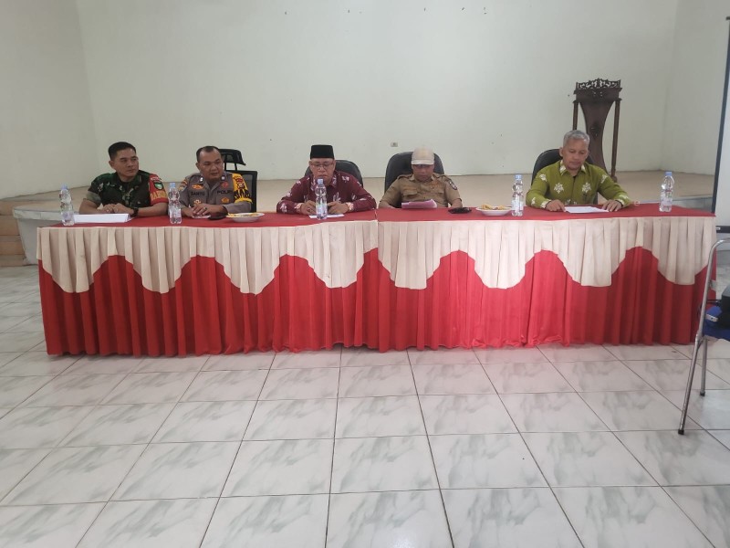 Polsek Bandar Sei Kijang Hadiri Musdes Tutup Buku BUMDes Beringin Maju Bersama 2025 Berlangsung Aman di Desa Simpang Beringin