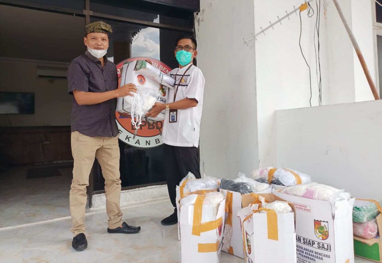 BPBD Pekanbaru Bersama Forum Pemred Riau Bagi-bagi Masker